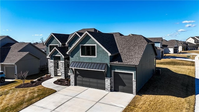 view of front of house featuring stone siding, a residential view, metal roof, a standing seam roof, and stucco siding