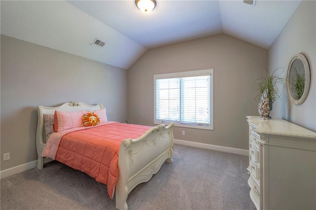 carpeted bedroom featuring lofted ceiling