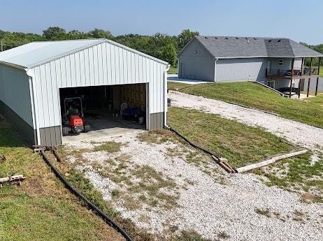 garage with a yard