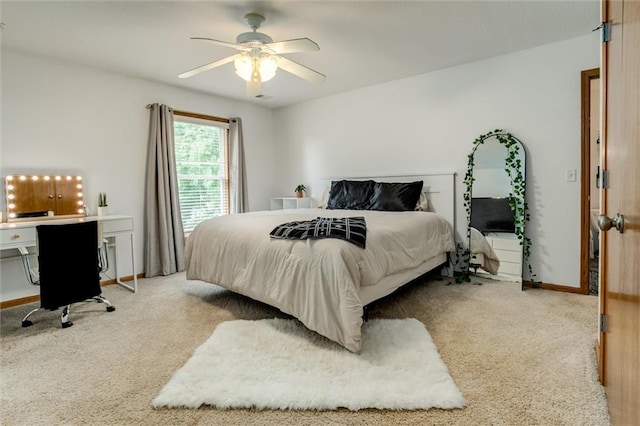 bedroom with ceiling fan and carpet flooring