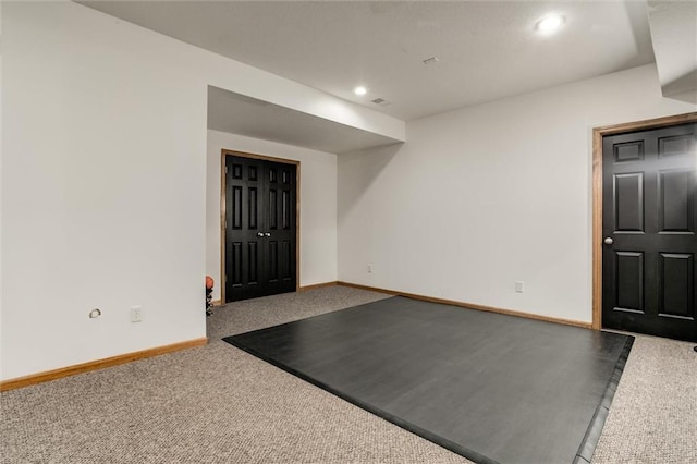 entryway featuring carpet floors