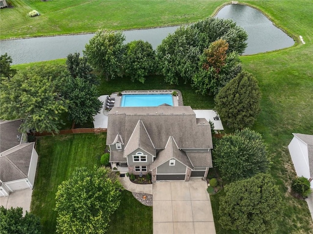 bird's eye view with a water view