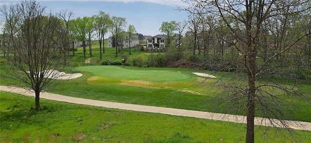 8732 N Lewis Ave, Kansas City, MO 64157 - surrounding community with golf course view and a yard