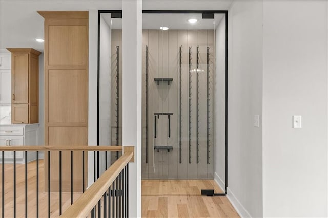 8732 N Lewis Ave, Kansas City, MO 64157 - corridor with light wood-style flooring, recessed lighting, and baseboards