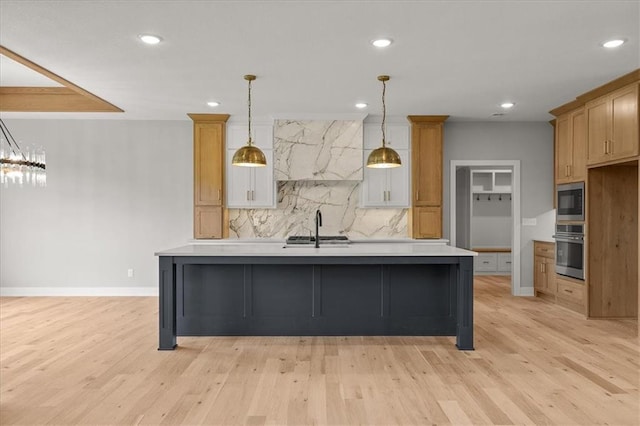 8732 N Lewis Ave, Kansas City, MO 64157 - kitchen with appliances with stainless steel finishes, decorative backsplash, light countertops, baseboards, and recessed lighting