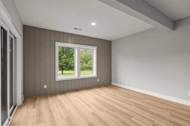 8732 N Lewis Ave, Kansas City, MO 64157 - empty room featuring light wood-style floors, baseboards, and recessed lighting