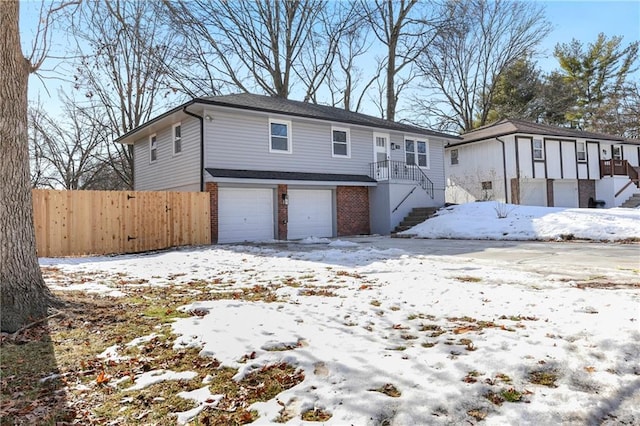 view of front of home with a garage