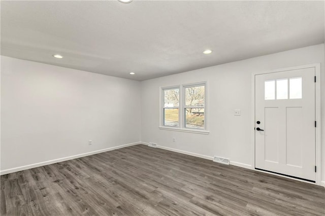 entrance foyer with dark hardwood / wood-style flooring