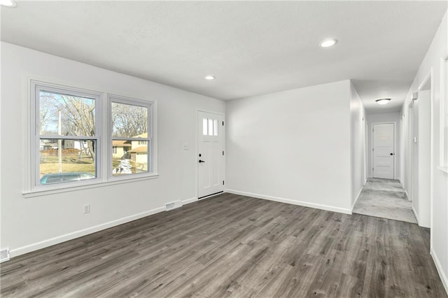 entrance foyer featuring dark hardwood / wood-style floors