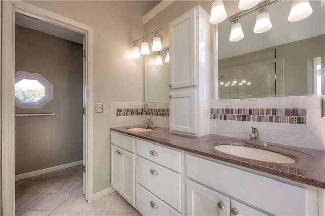 bathroom with vanity and tile patterned flooring