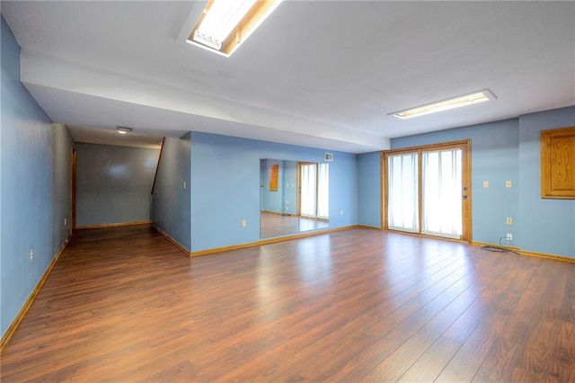 empty room with wood-type flooring