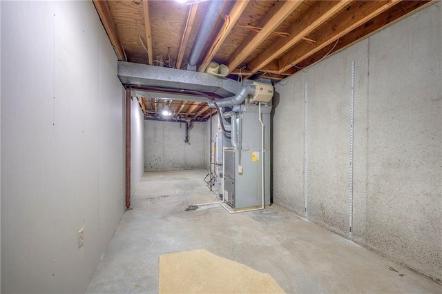 basement featuring heating unit