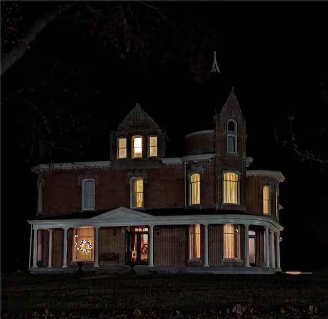 view of back house at night