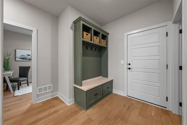 8720 N Lewis Ave, Kansas City, MO 64157 - mudroom featuring light wood-style flooring and baseboards