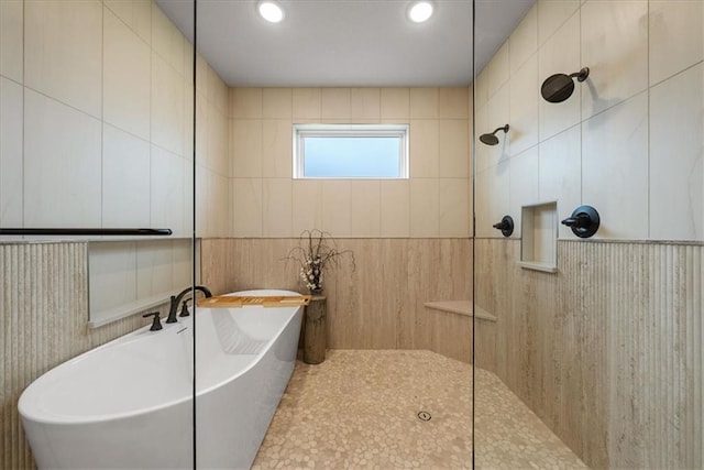 8720 N Lewis Ave, Kansas City, MO 64157 - bathroom featuring a freestanding tub, a walk in shower, and recessed lighting