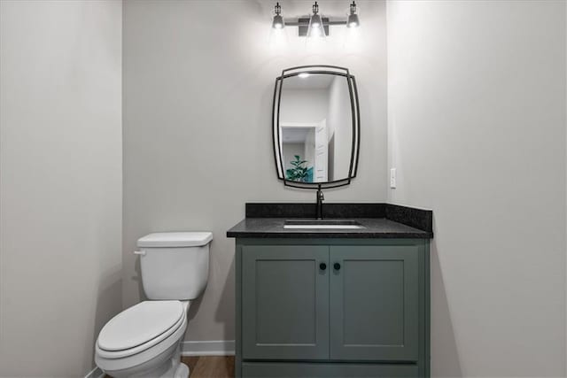 8720 N Lewis Ave, Kansas City, MO 64157 - bathroom with toilet and vanity