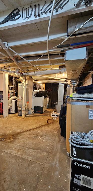 basement featuring gas water heater