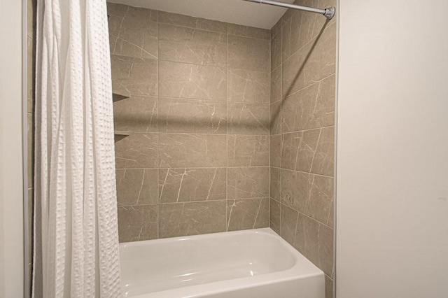 full bathroom featuring shower / tub combo with curtain