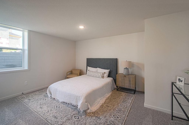 bedroom with carpet floors, baseboards, and recessed lighting