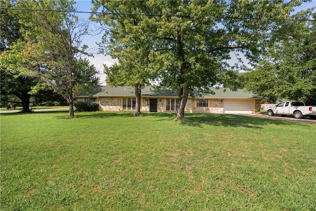 ranch-style house with a front yard