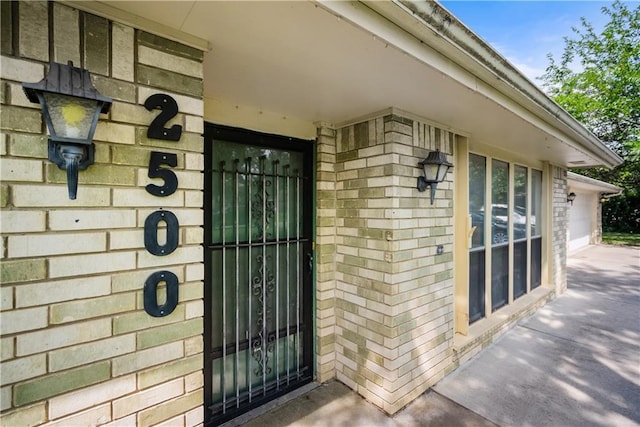 property entrance featuring a garage