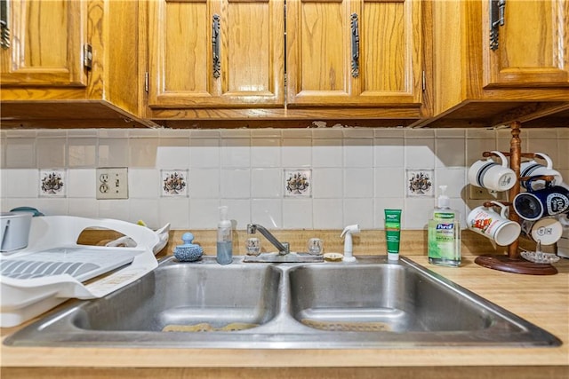 details with sink and tasteful backsplash