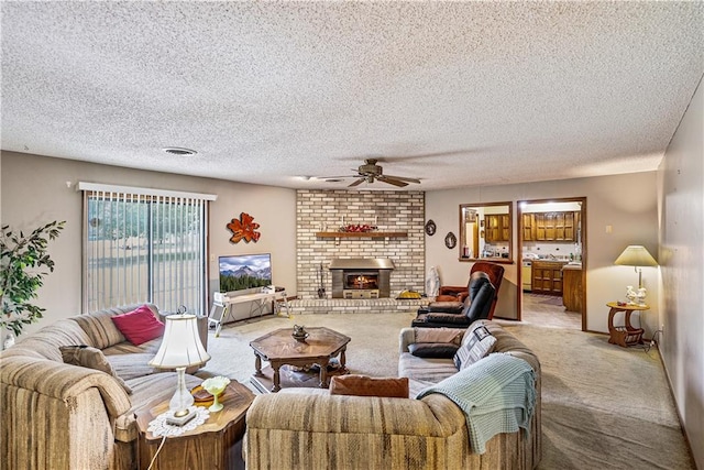 living room featuring a textured ceiling, light colored carpet, and a brick fireplace