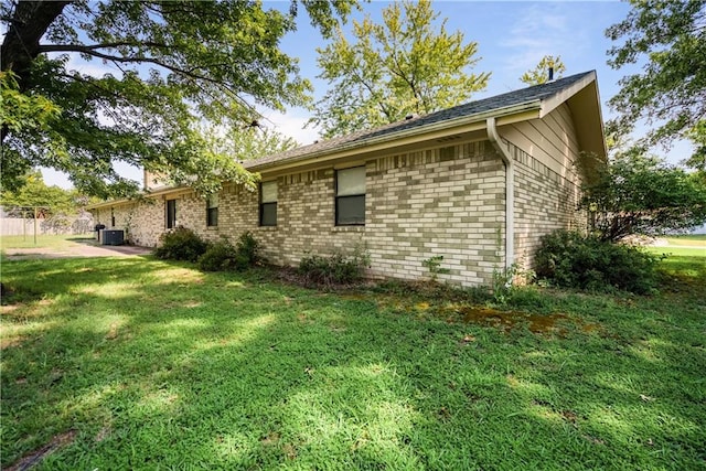 view of property exterior with a yard