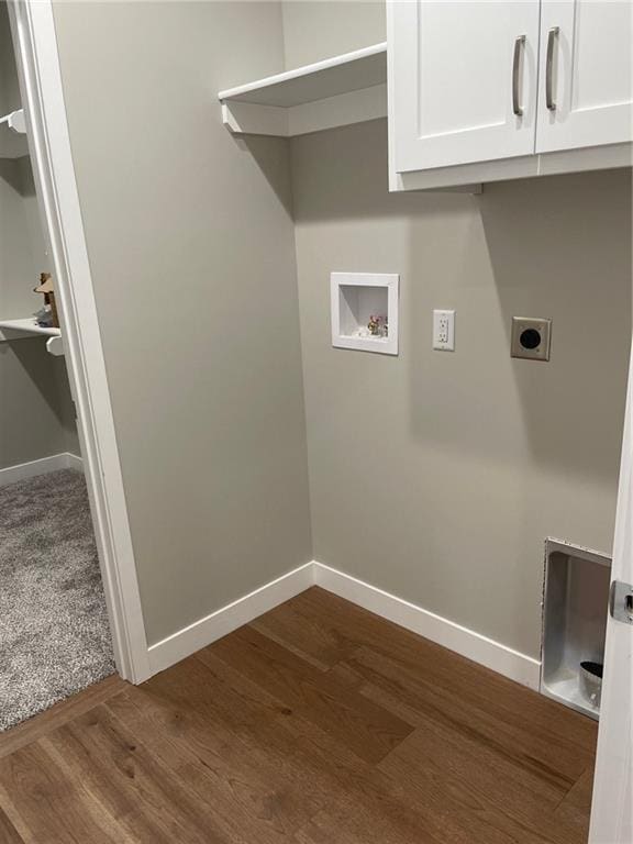 laundry room featuring cabinets, hookup for an electric dryer, dark wood-type flooring, and washer hookup