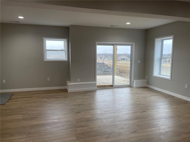 empty room featuring light hardwood / wood-style floors