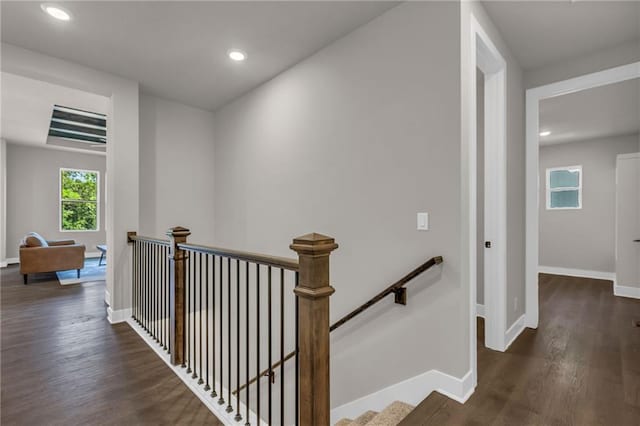 corridor featuring dark hardwood / wood-style flooring