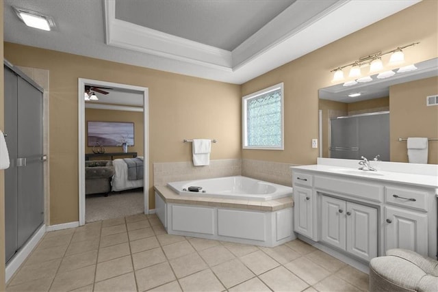 bathroom with vanity, crown molding, tile patterned flooring, ceiling fan, and shower with separate bathtub