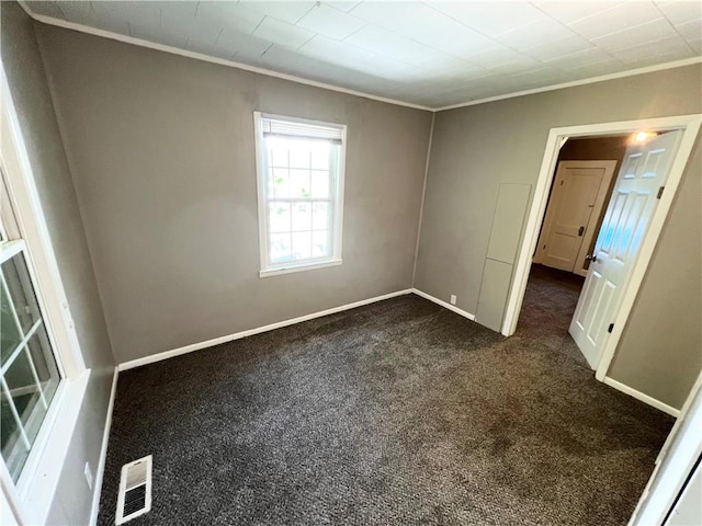 unfurnished bedroom featuring carpet