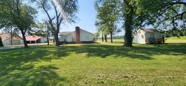 5960 SE Beasley Rd, Riverton, KS 66770 - view of yard with an outdoor structure