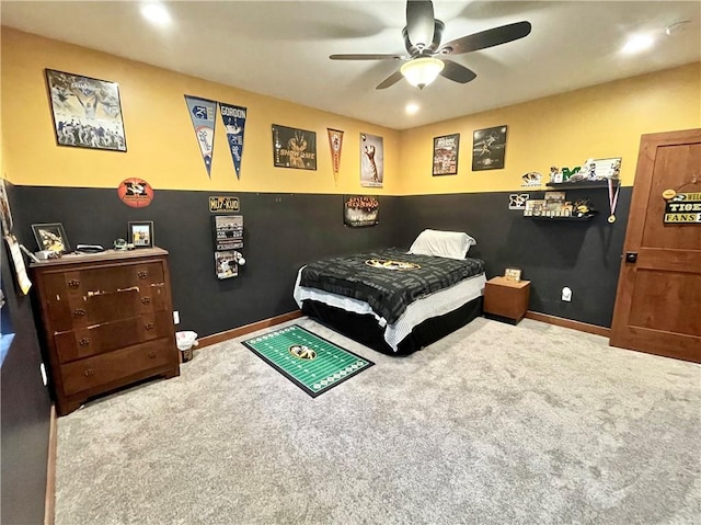 bedroom featuring ceiling fan and light colored carpet