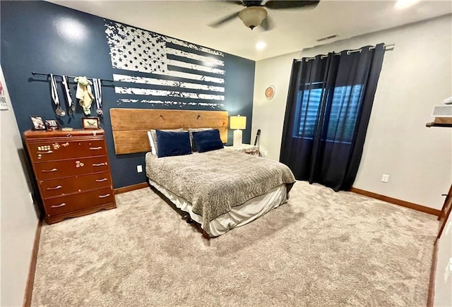 bedroom featuring ceiling fan and light colored carpet