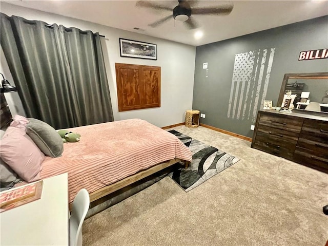 carpeted bedroom with ceiling fan