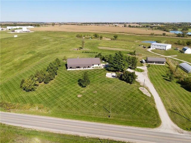 aerial view featuring a rural view and a water view