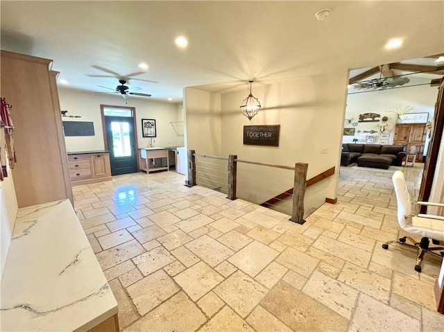 living room with ceiling fan