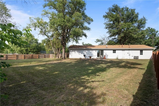 view of yard with central AC