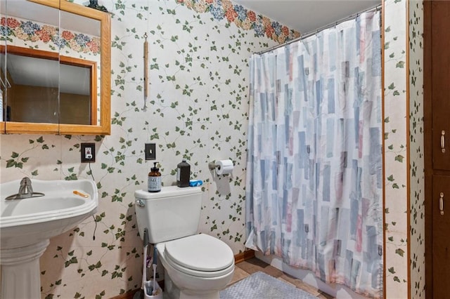 bathroom featuring toilet