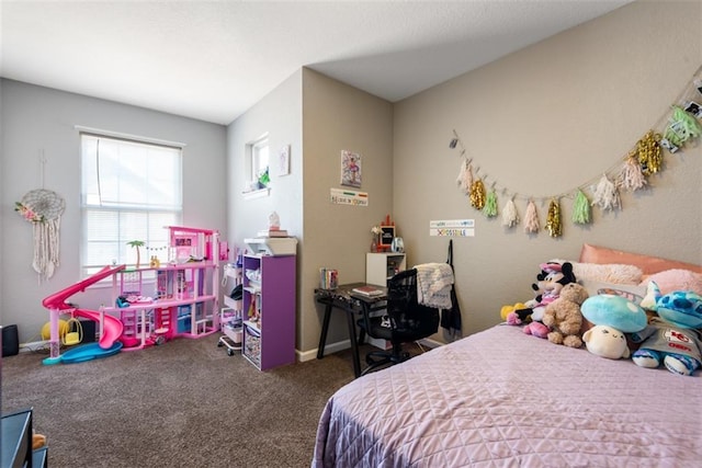 bedroom featuring baseboards and carpet floors