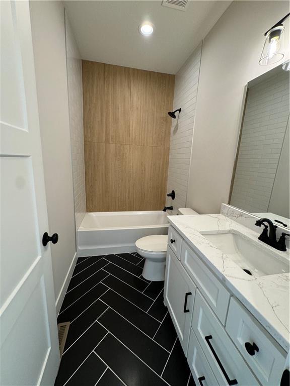 full bathroom featuring visible vents, shower / bathtub combination, toilet, recessed lighting, and vanity