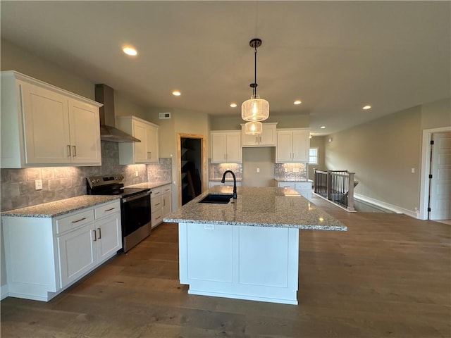 kitchen with white cabinetry, stainless steel electric stove, and sink