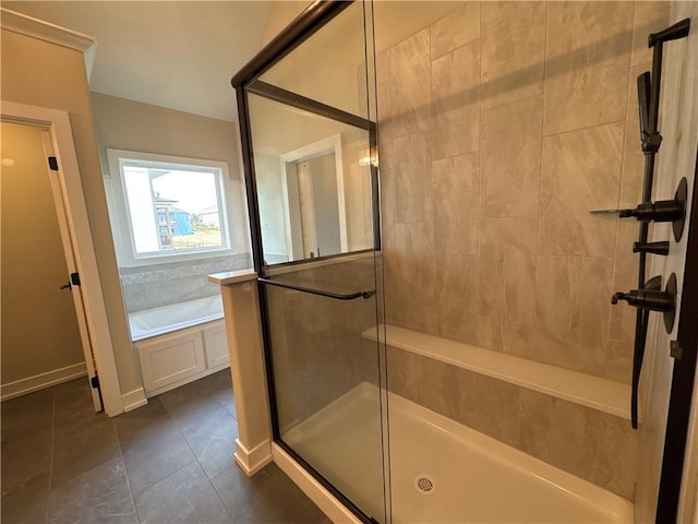 bathroom featuring independent shower and bath and tile patterned floors