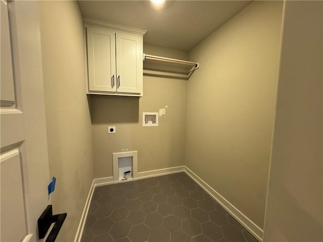 clothes washing area featuring washer hookup, cabinets, and hookup for an electric dryer