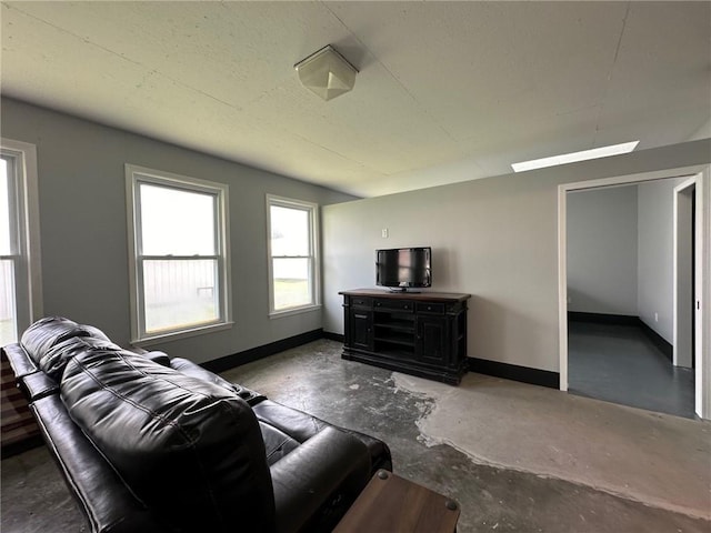 living room featuring concrete floors