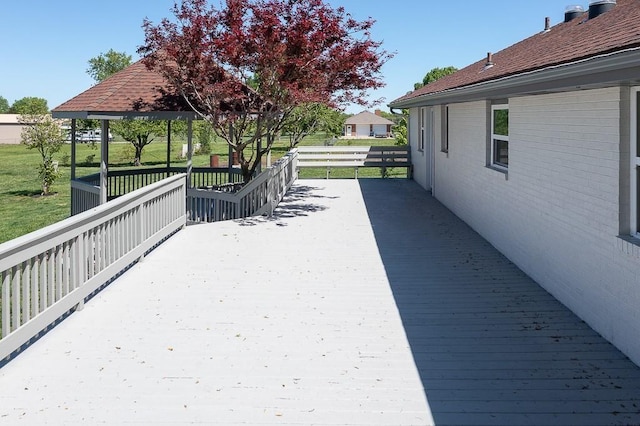 exterior space with a deck and a gazebo