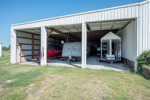 view of parking with a yard