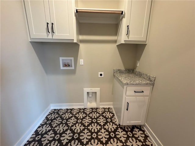 laundry room featuring cabinets, washer hookup, and electric dryer hookup